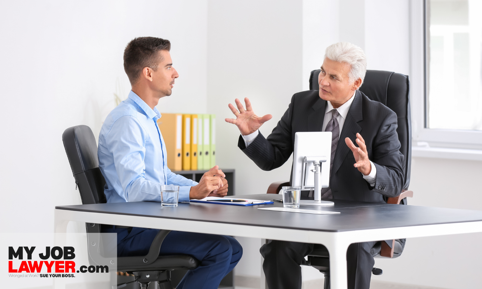Employee consulting an employment lawyer about workplace discrimination case